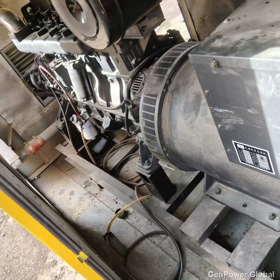 Engine end and brushless alternator of a BF-300GF 300kW generating set with the canopy door open